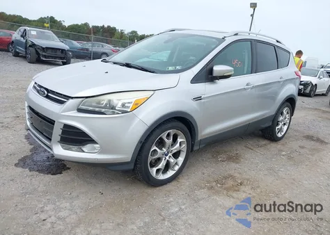 2014 Ford Escape Titanium z USA, uszkodzony, nr VIN 1FMCU9JX6EUC18537